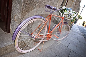 Old orange bicycle