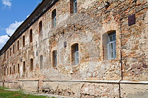 Old orange brick wall with windows