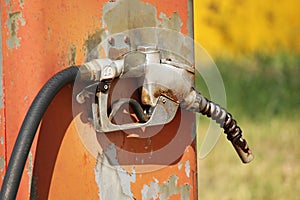 Old Orange Diesel Pump With Nozzle