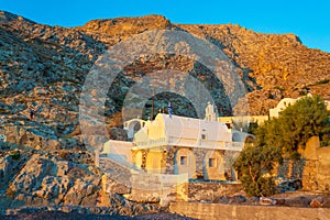 Old orthodox church building at sunrise Kamari village Santorini Greece