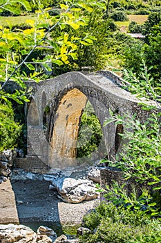 Old ottoman bridge Ura e Mesit near village Boks in Albania