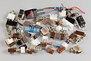 Old outdated electrical switches of different design and purposes