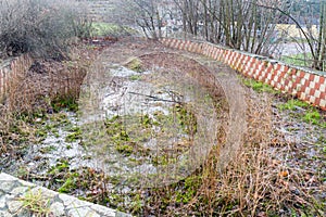 Old outdoor abandoned swimming pool