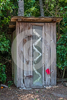 An Old Outhouse in the Woods