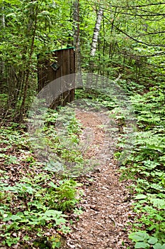 Old Outhouse in the Woods