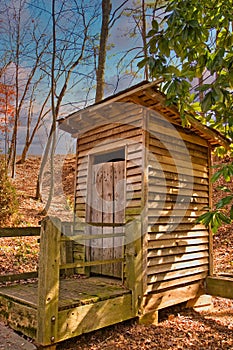 Old Outhouse in Woods