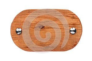 Old oval wooden board with chrome bolts. Isolated