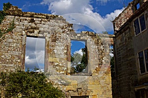 Old Over Grown Stone Walls with Empty Windows