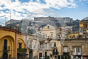 Old overcrowded apartment houses with balconies - dense living in overpopulated Napoli center, Italy