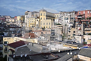Old overcrowded apartment houses with balconies - dense living in overpopulated Napoli center, Italy