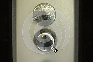 Old oxidized knobs for hot and cold water in the shower