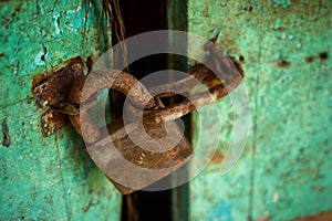 Old padlock corroded by sea humidity