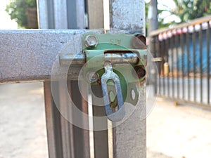 Old padlock security on the gate