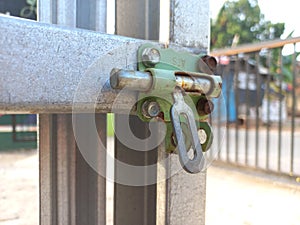Old padlock security on the gate