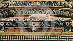 Old Pagoda Decorate With Colorful Ceramic Tile And White Cat