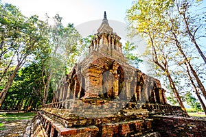 Old pagoda with teak trees in Pa Sak temple