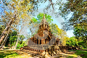 Old pagoda with teak trees in Pa Sak temple