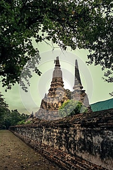 Old pagodas and old brick wall at Wat Phutthaisawan in Sampao Lom subdistrict,Phra Nakorn Sri Ayutthaya ,Thailand.