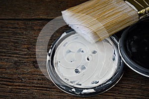 Old Paint Can Lids and Paint Brush