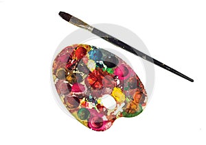 Old paint palette brush