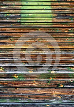 Old painted peeled off dark brown wood planks texture background backdrop