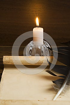 Old paper with a candle