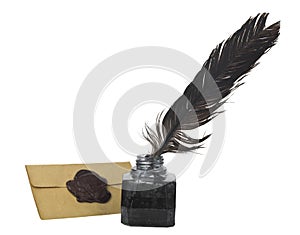 Old paper inkwell and feather isolated on white background close-up