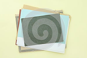 Old paper retro stack on yellow background