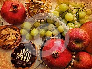 Old paper texture with gorgeous ripe sweet fruit and cream cakes. Red apples, pomegranates and green grapes. Edible gift