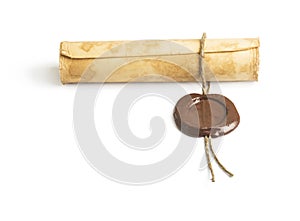 Old paper with a wax seal isolated on white background