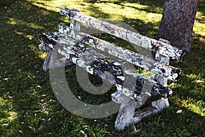 Old park bench with deteriorating wood