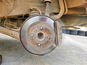 An old are parks in the garage waiting for change a new tyre in local garage of Thailand countryside. Pranburi, Thailand January