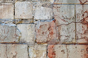 Old partly damaged stucco wall. Close shoot.