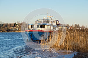 Old passenger ship on the freezing Volkhov river. Staraya Ladoga