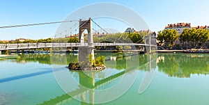 Old Passerelle du College bridge over Rhone river in Lyon, Franc