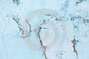 Old pastel blue wall with abrasions. Background with marble effect, copy space, minimal style backdrop