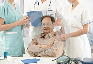 Old patient sitting on doctor's room