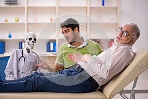 Old male patient visiting skeleton doctor