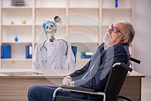 Old patient in wheel-chair visiting devil doctor