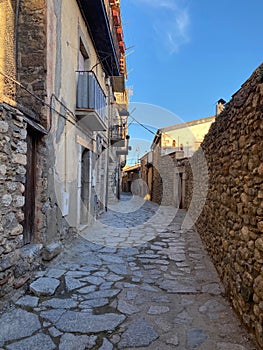 Old paved street with cobble stones in a rural village in Bellver de Cerdanya