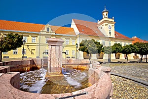 Old paved street and fountain in Tvrdja historic town of Osijek