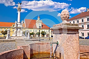 Old paved street and fountain in Tvrdja historic town of Osijek