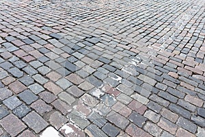 Old paving stones and remnants of road markings