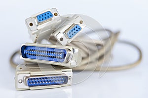 Old PC cables on a white table .. Com and lpt connectors for old