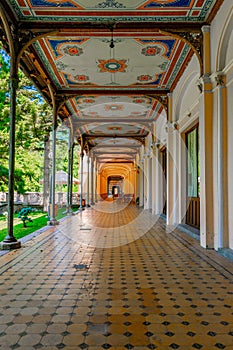 Old pedestrian corridor corridor in Herculane, Romania photo