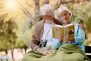Old, people and book with a mature couple reading in the park for knowledge and education. Bonding, read and love with a