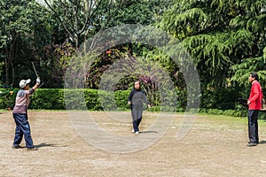 Old people playing diabolo in fuxing park shanghai china