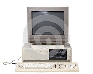 Old personal computer isolated on white background