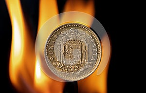 Old Peseta coin with the coat of arms of Franco`s Spain photo