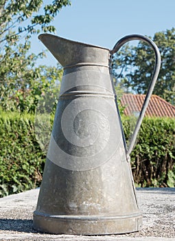 A old pewter pitcher outdoor